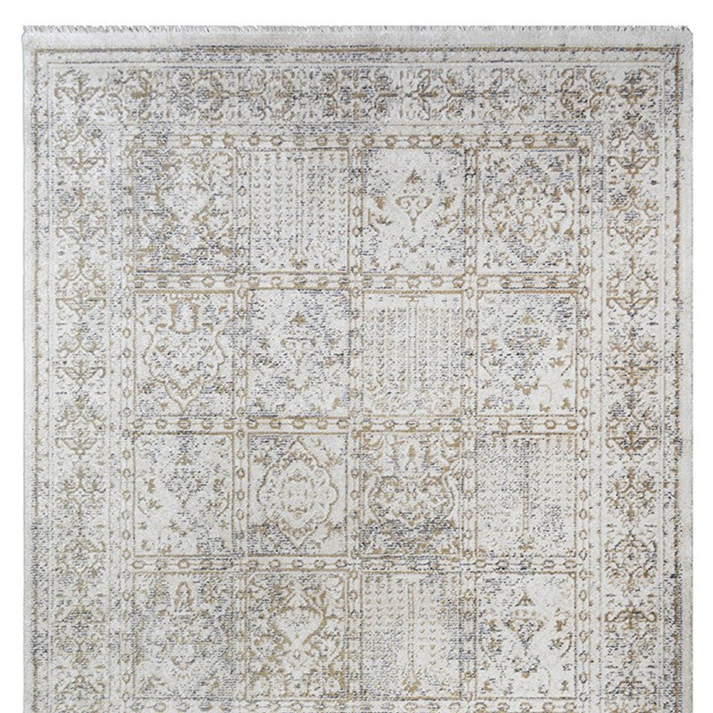 5' X 8' Ivory Oriental Distressed Area Rug With Fringe