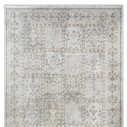 5' X 8' Ivory Oriental Distressed Area Rug With Fringe