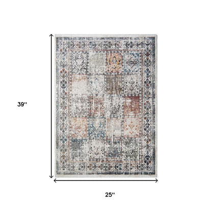 2' X 3' Ivory Blue and Gray Patchwork Distressed Area Rug With Fringe