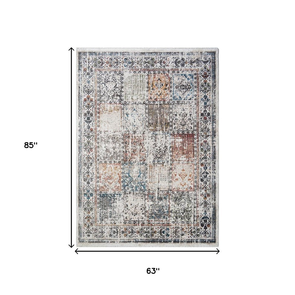 5' X 8' Ivory Oriental Distressed Area Rug With Fringe