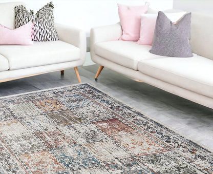 9' X 13' Ivory Oriental Distressed Area Rug With Fringe