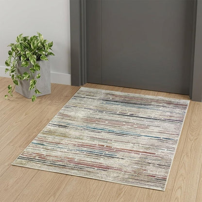 2' X 3' Beige Geometric Distressed Area Rug With Fringe