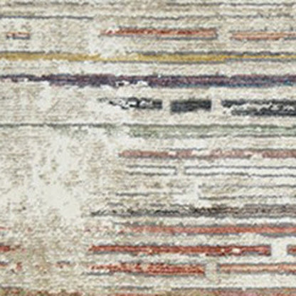 2' X 3' Beige Geometric Distressed Area Rug With Fringe