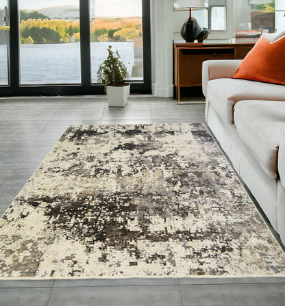 5' X 8' Black Abstract Distressed Area Rug With Fringe