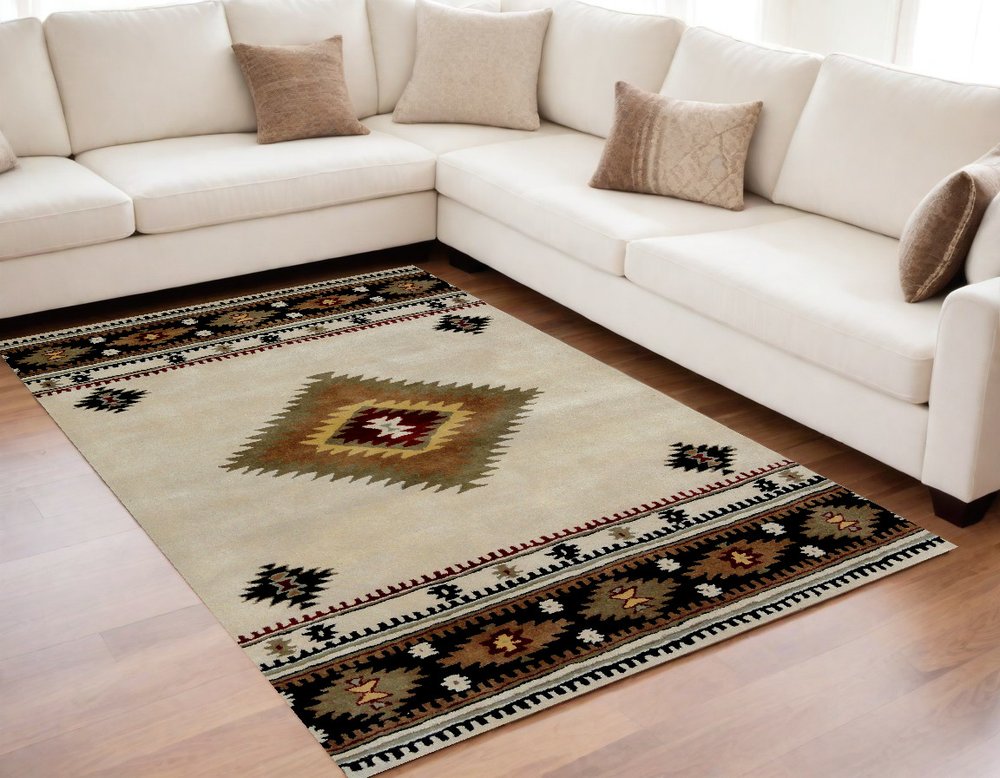 5' X 8' Ivory and Black Southwestern Hand Tufted Non Skid Area Rug