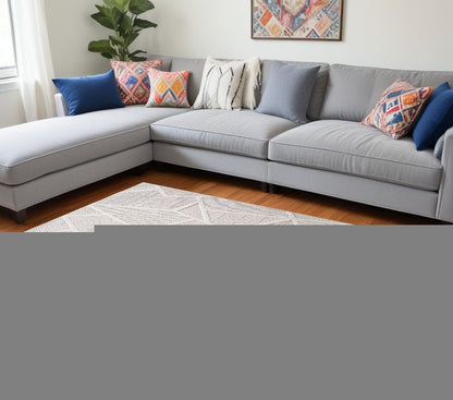 7' X 10' Cream and Beige Geometric Distressed Area Rug