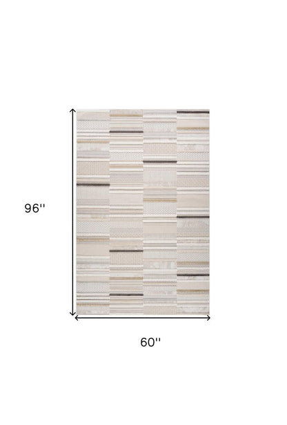 5' X 8' Gray and Beige Abstract Distressed Area Rug