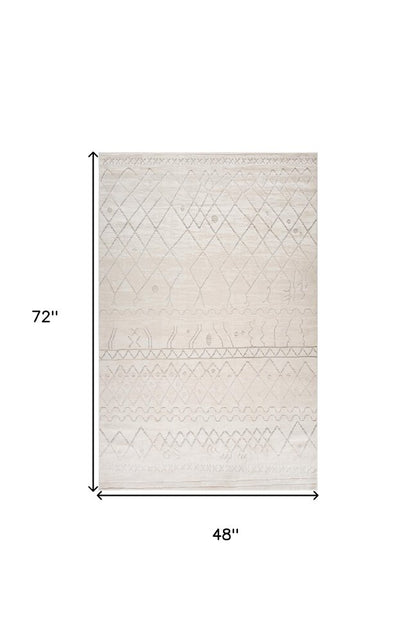 4' X 6' Gray and Beige Abstract Distressed Area Rug