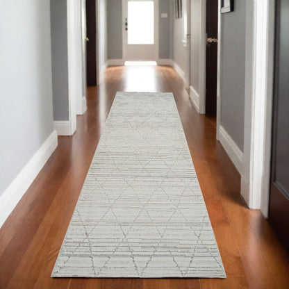 8' Gray And Beige Geometric Distressed Runner Rug