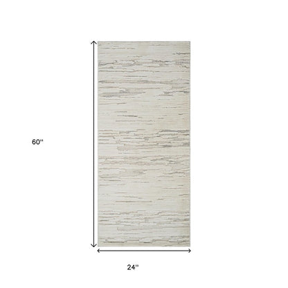 2' X 5' Gray and Beige Geometric Distressed Area Rug