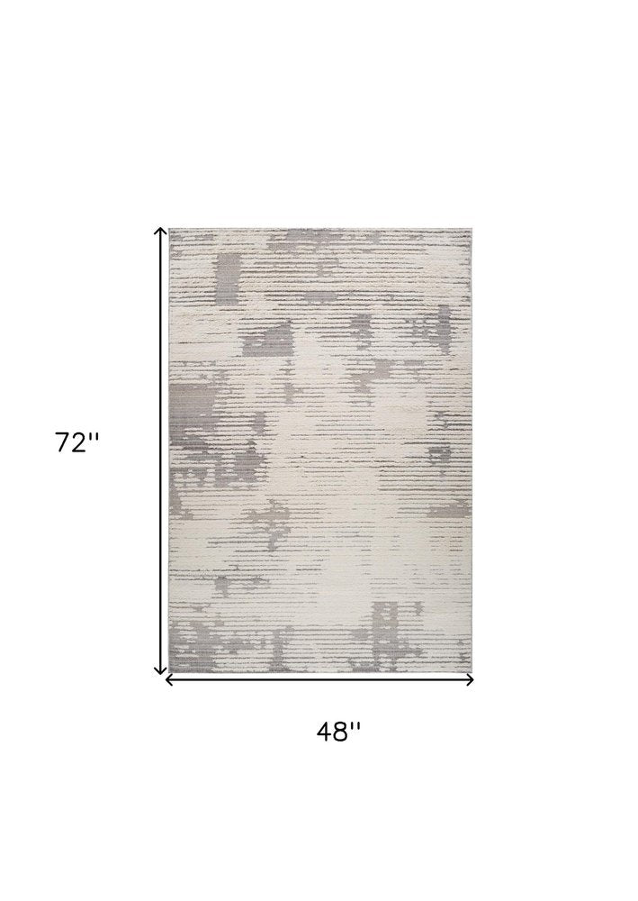 4' X 6' Gray and Cream Abstract Distressed Area Rug
