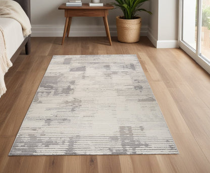 4' X 6' Gray and Cream Abstract Distressed Area Rug