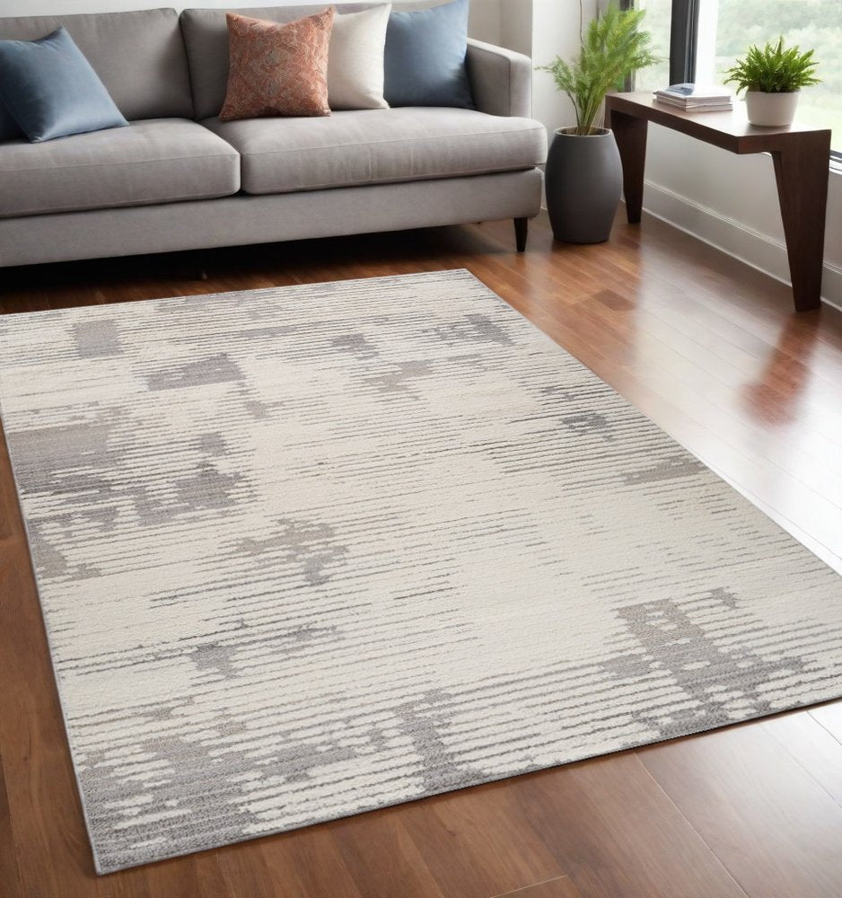 5' X 8' Gray and Cream Abstract Distressed Area Rug