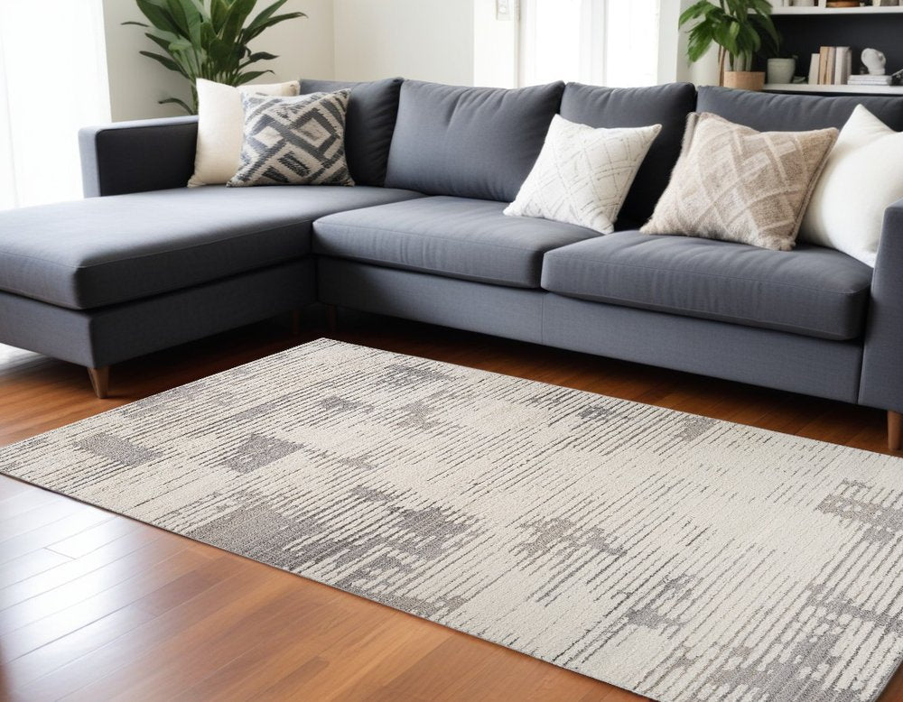 7' X 10' Gray and Cream Abstract Distressed Area Rug