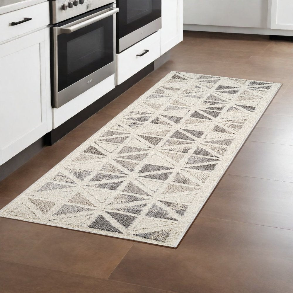 8' Gray And Cream Geometric Distressed Runner Rug