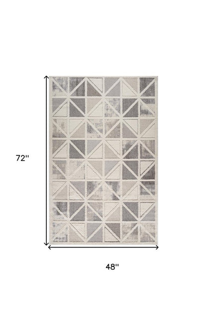 4' X 6' Gray and Cream Geometric Distressed Area Rug