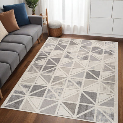 5' X 8' Gray and Cream Geometric Distressed Area Rug