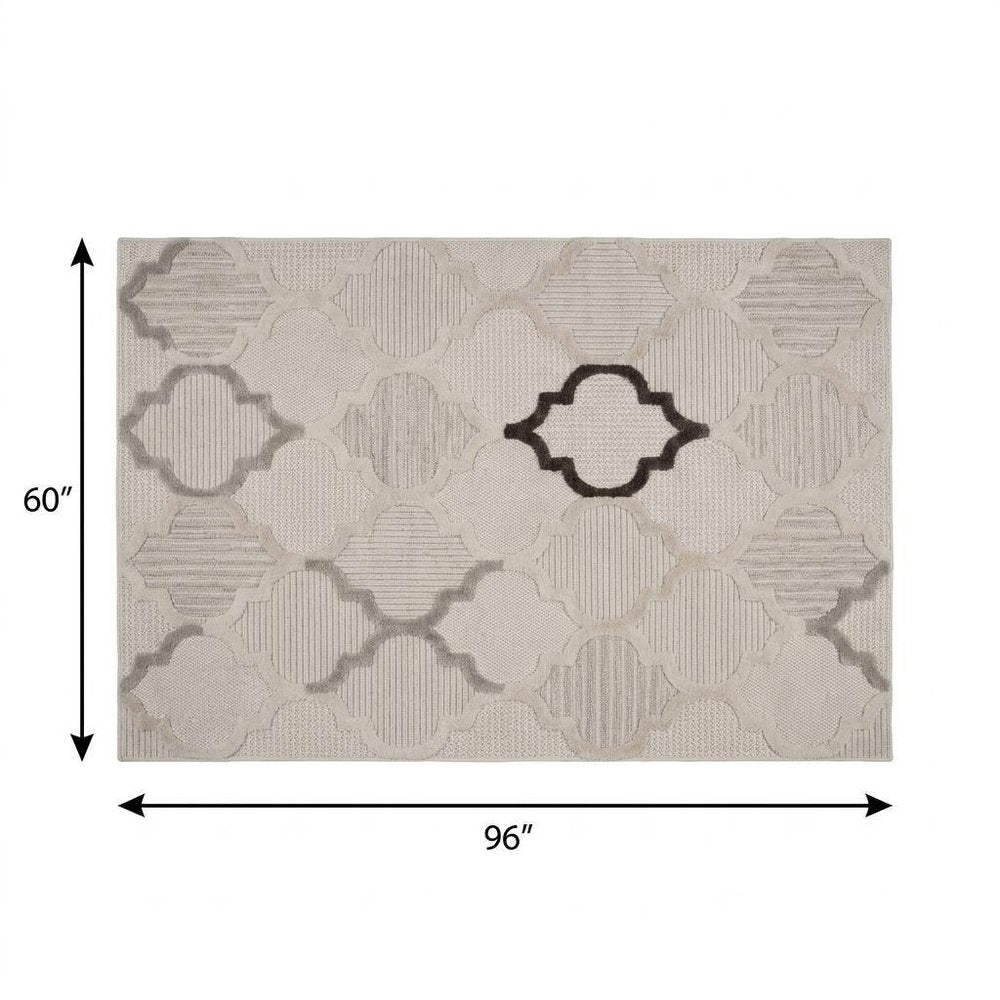 5' X 8' Cream and Beige Geometric Distressed Area Rug