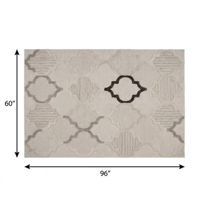 5' X 8' Cream and Beige Geometric Distressed Area Rug