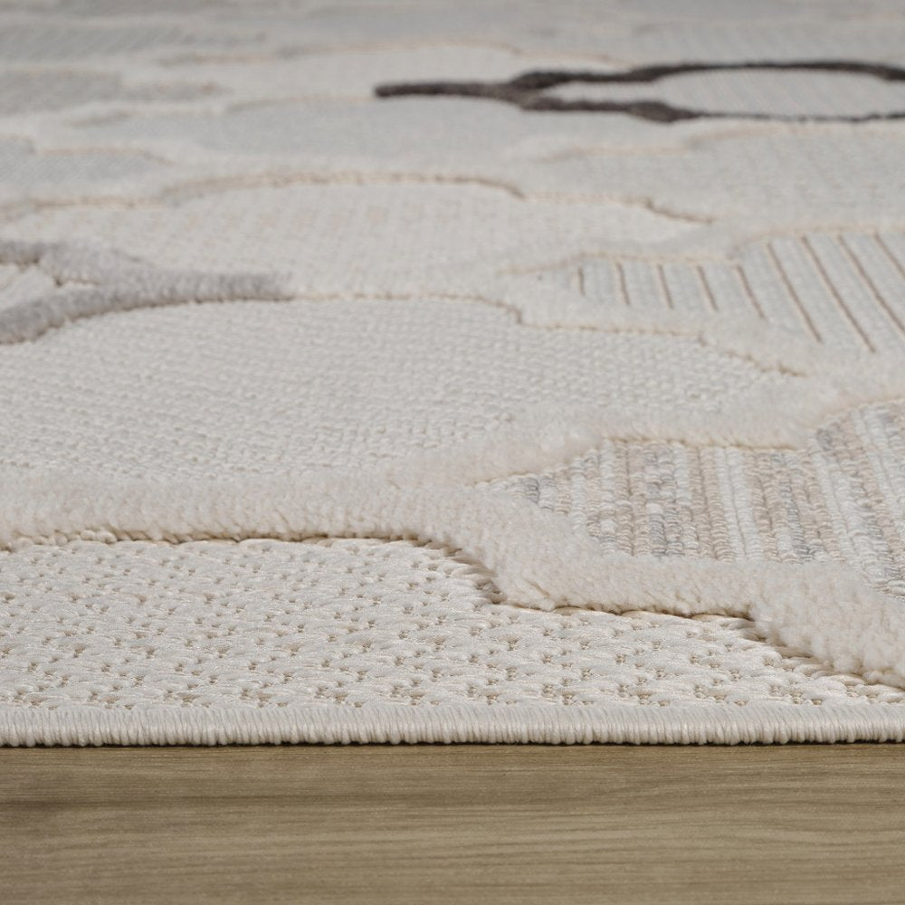 7' X 10' Cream and Beige Geometric Distressed Area Rug