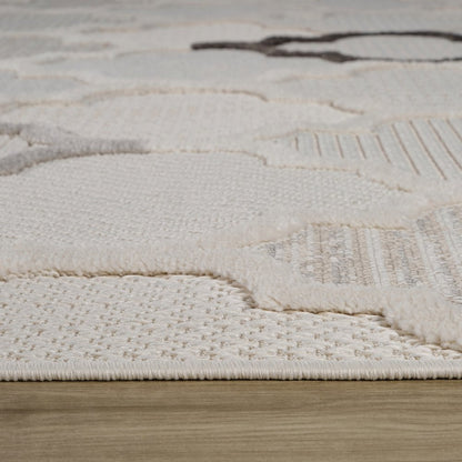 7' X 10' Cream and Beige Geometric Distressed Area Rug