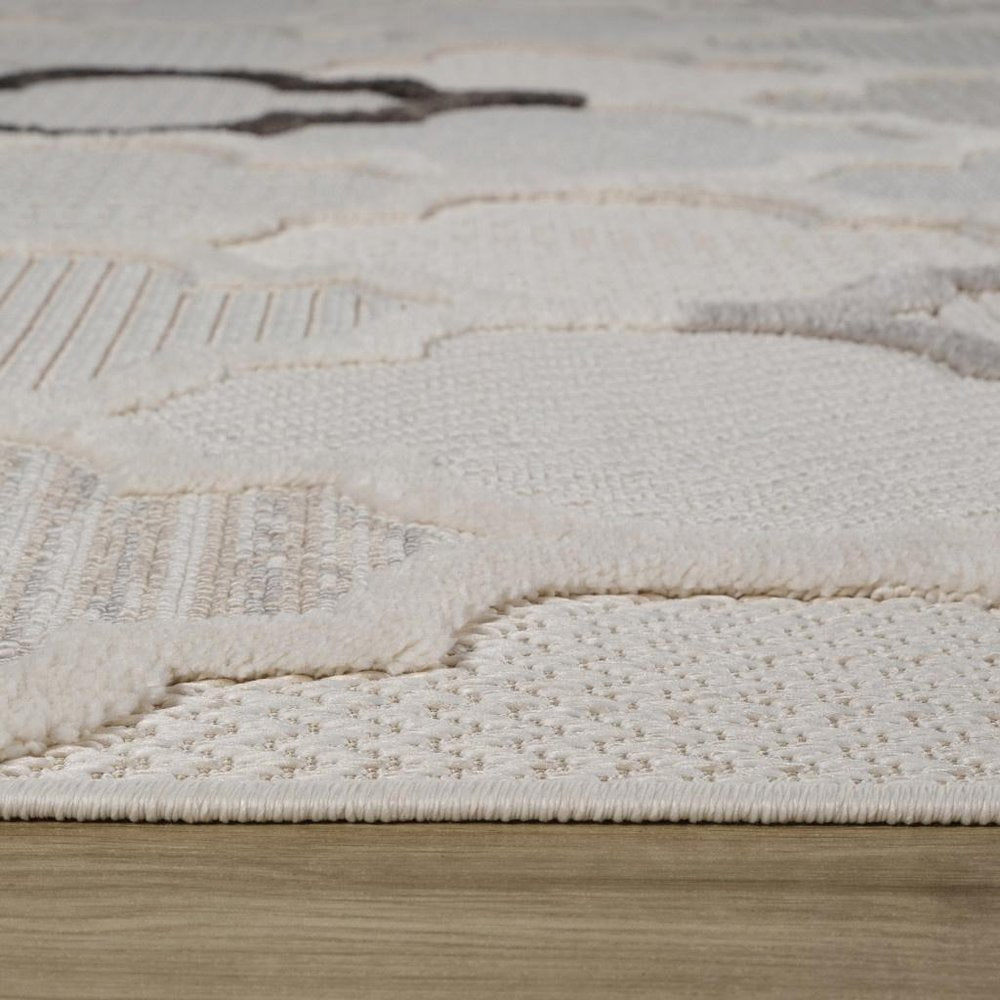7' X 10' Cream and Beige Geometric Distressed Area Rug