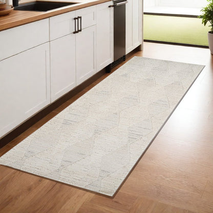 8' Cream and Beige Geometric Distressed Runner Rug