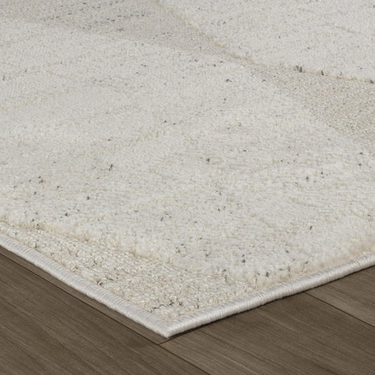 5' X 8' Cream and Beige Geometric Distressed Area Rug