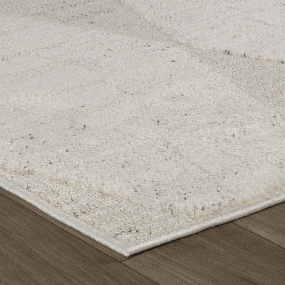 5' X 8' Cream and Beige Geometric Distressed Area Rug