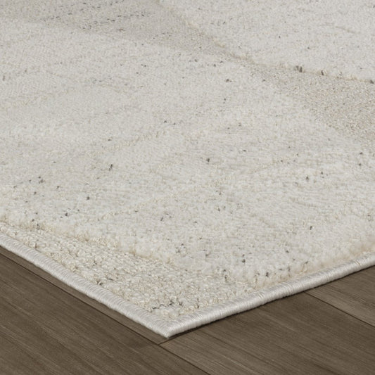 5' X 8' Cream and Beige Geometric Distressed Area Rug