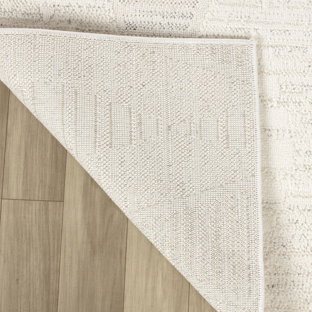 5' X 8' Cream and Beige Geometric Distressed Area Rug