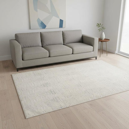 5' X 8' Cream and Beige Geometric Distressed Area Rug