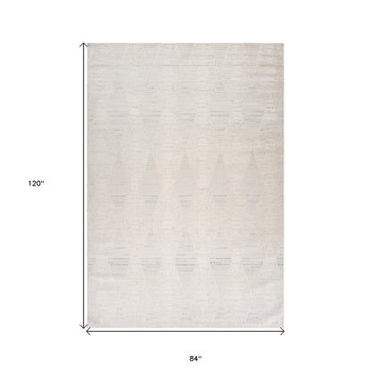 7' X 10' Cream and Beige Geometric Distressed Area Rug