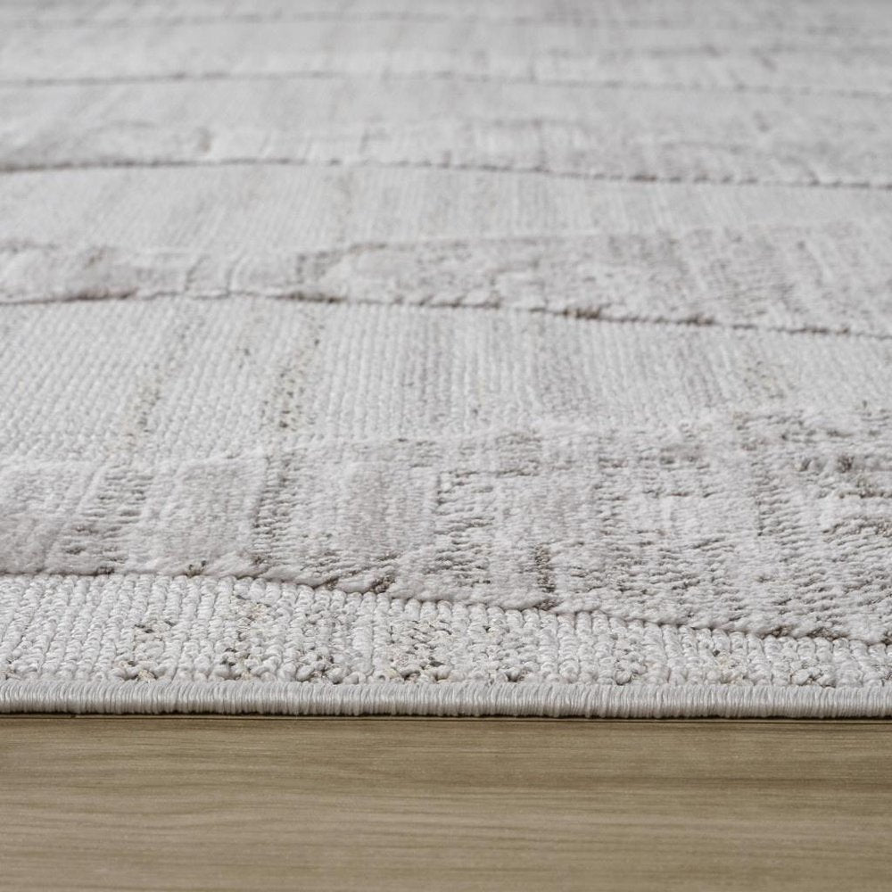 8' Gray And Ivory Geometric Distressed Runner Rug