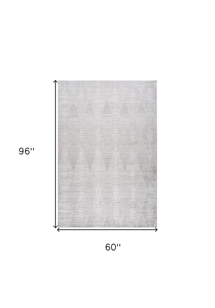 5' X 8' Gray and Ivory Geometric Distressed Area Rug