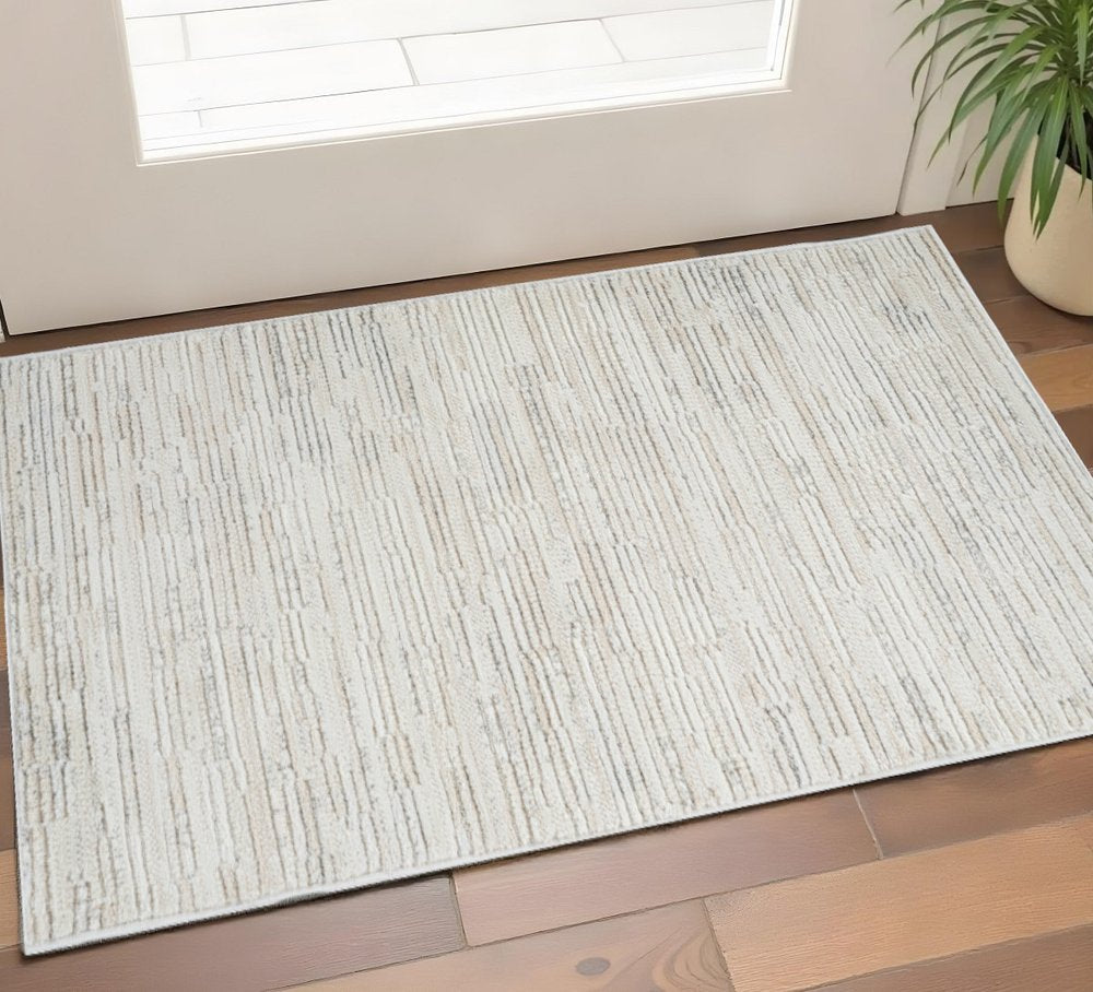 2' X 5' Gray and Beige Geometric Distressed Area Rug