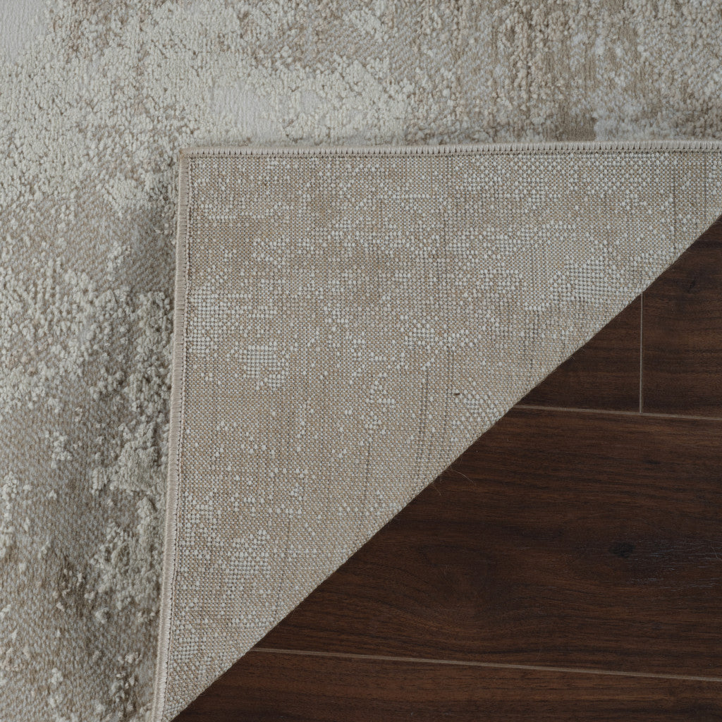 5' X 8' Cream and Beige Abstract Distressed Area Rug