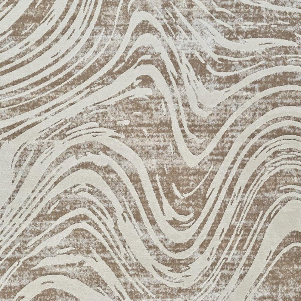 5' X 8' Beige and Brown Abstract Distressed Area Rug