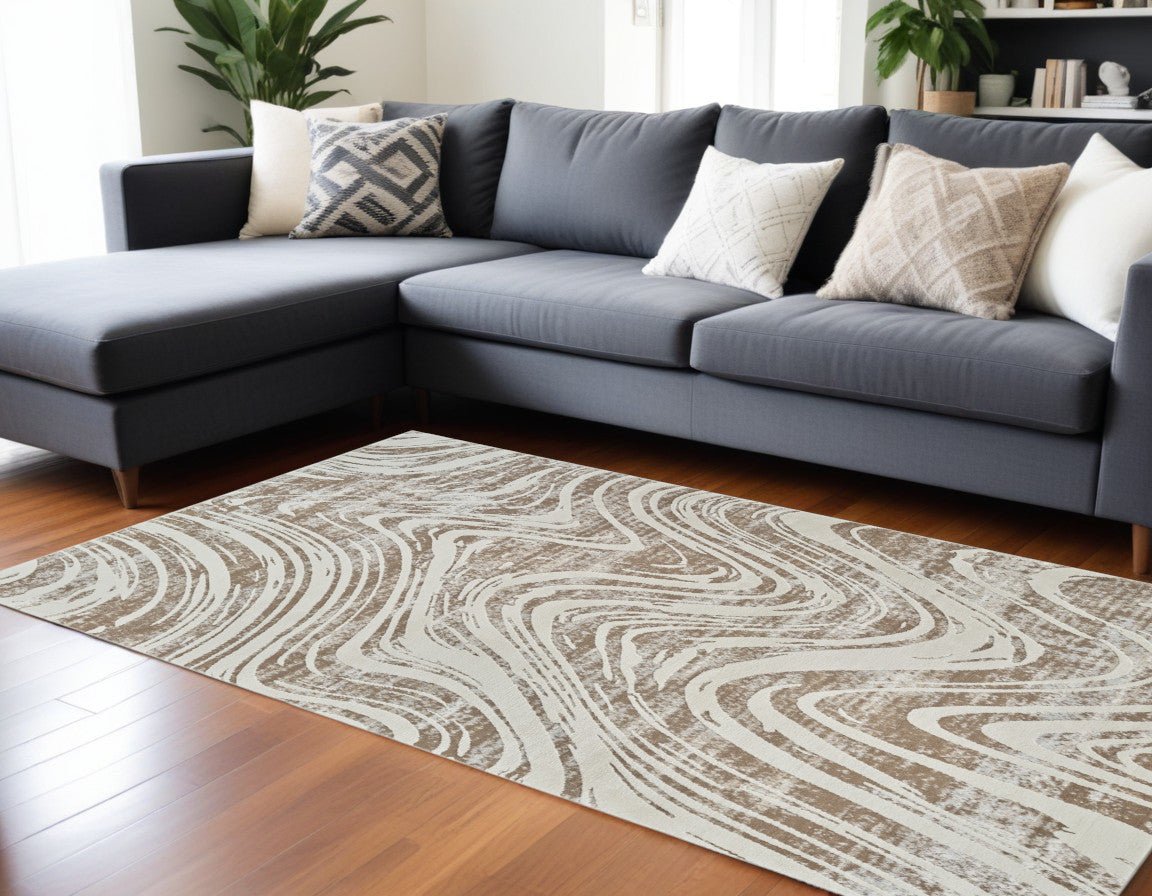 7' X 10' Beige and Brown Abstract Distressed Area Rug