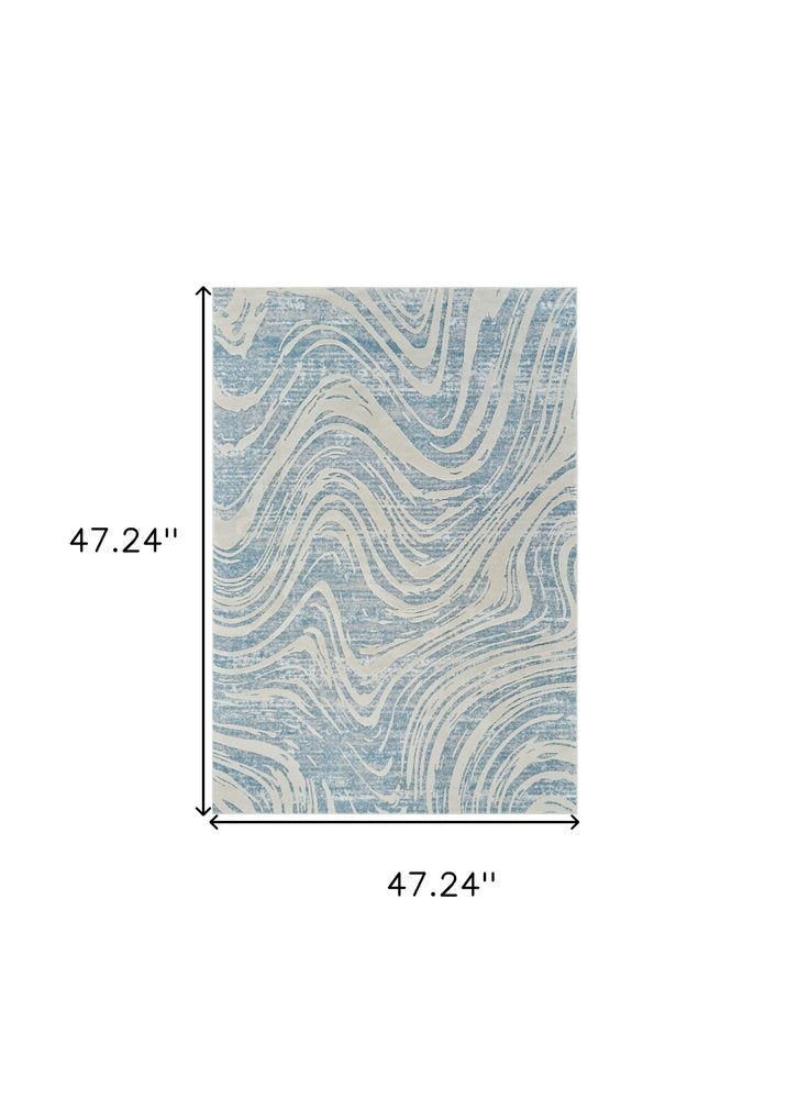 4' X 6' Blue and Beige Abstract Distressed Area Rug