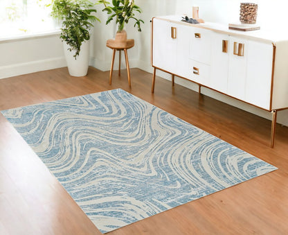 4' X 6' Blue and Beige Abstract Distressed Area Rug