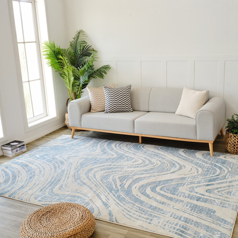 5' X 8' Blue and Beige Abstract Distressed Area Rug