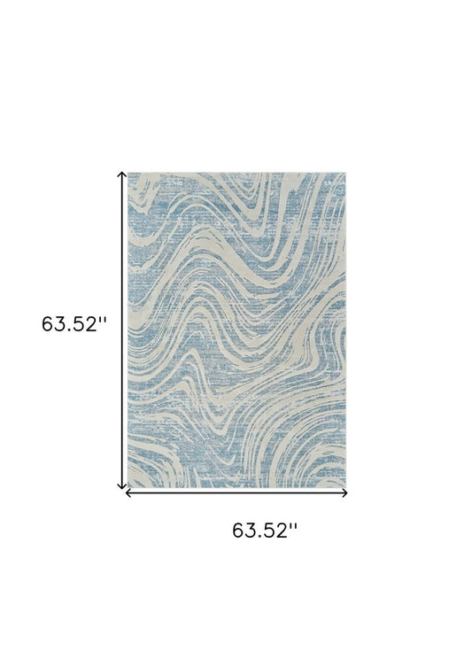 5' X 8' Blue and Beige Abstract Distressed Area Rug