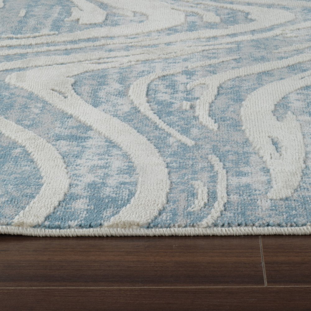5' X 8' Blue and Beige Abstract Distressed Area Rug