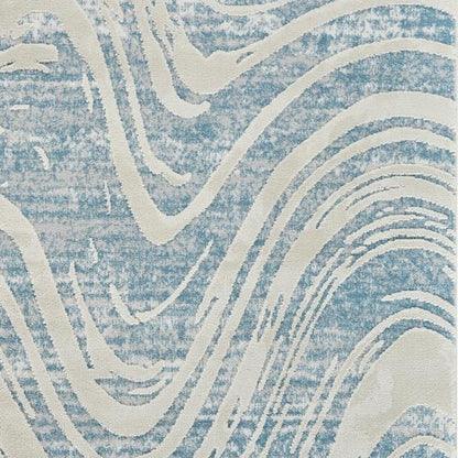 7' X 10' Blue and Beige Abstract Distressed Area Rug