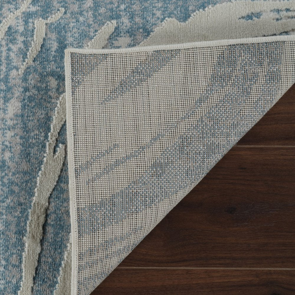 7' X 10' Blue and Beige Abstract Distressed Area Rug
