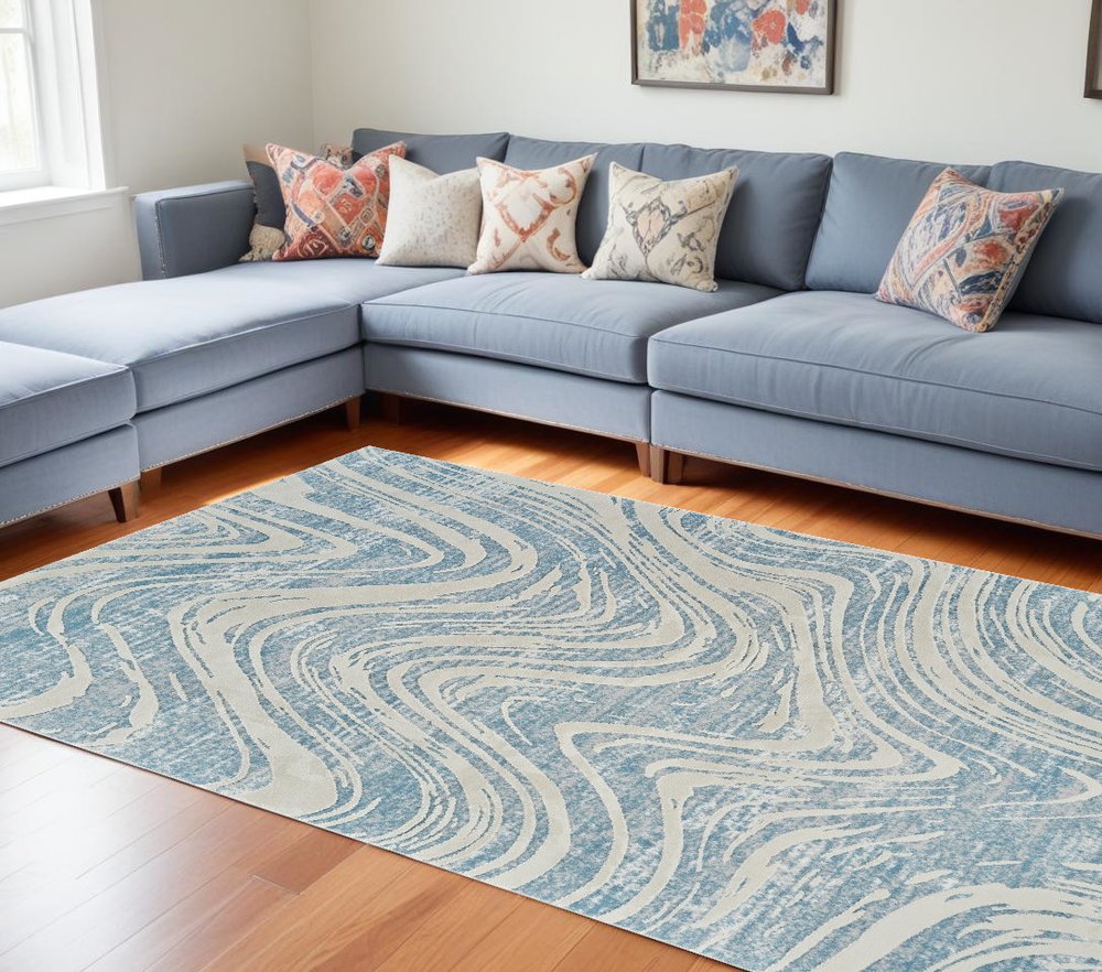 7' X 10' Blue and Beige Abstract Distressed Area Rug
