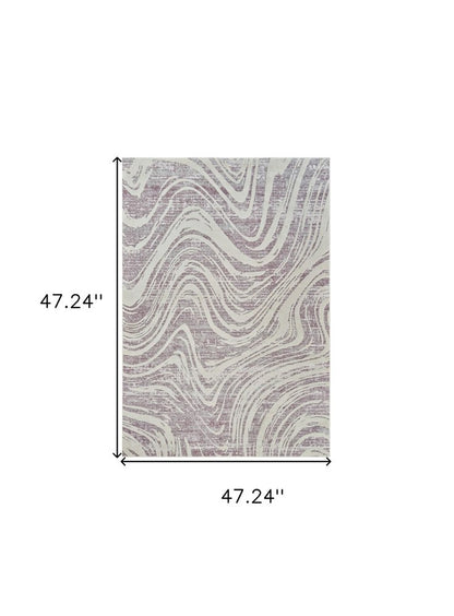 4' X 6' Beige and Purple Abstract Distressed Area Rug