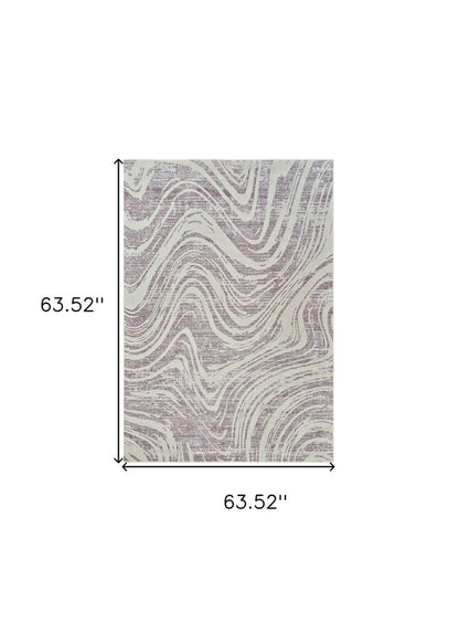 5' X 8' Beige and Purple Abstract Distressed Area Rug