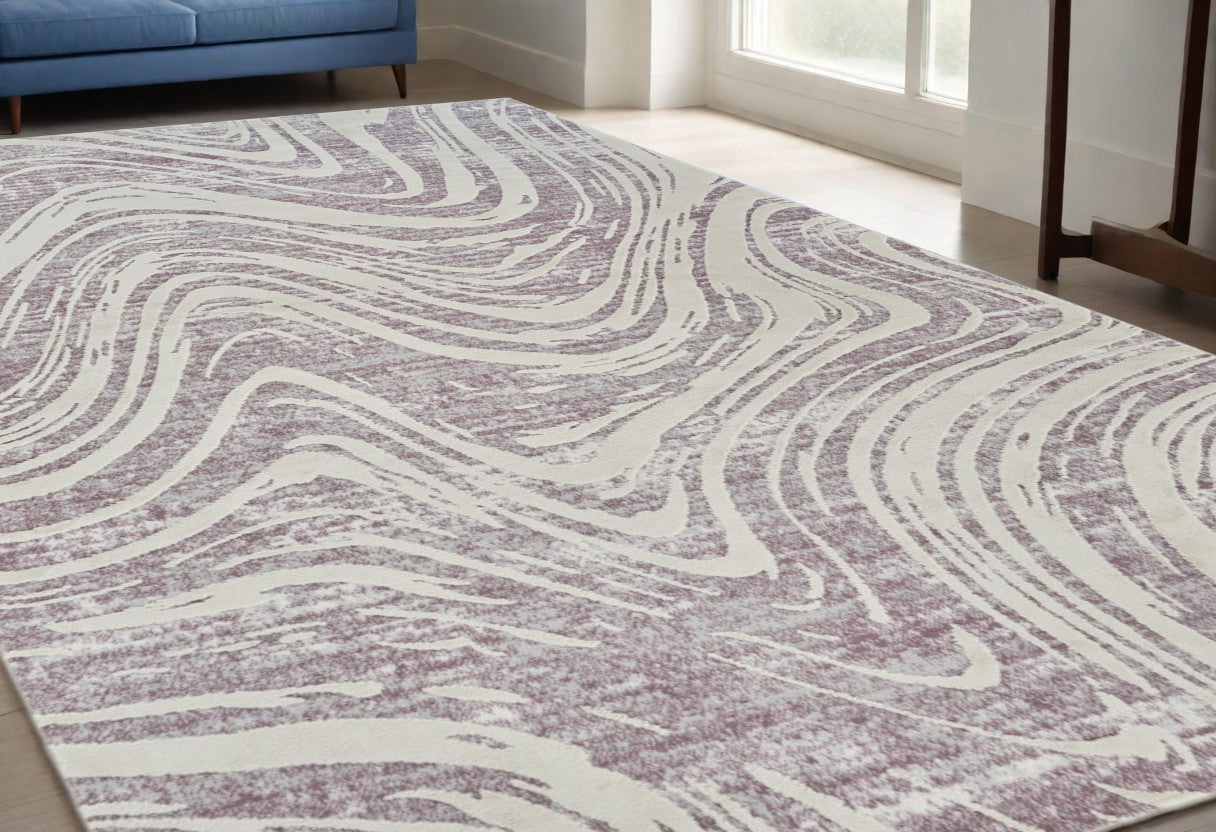 5' X 8' Beige and Purple Abstract Distressed Area Rug